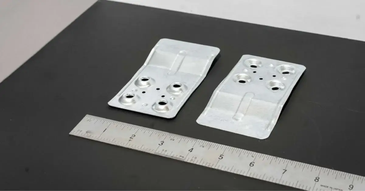 Stamped metal brackets for construction applications
